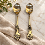 Ornate spoon set of two — marble dining table lifestyle view