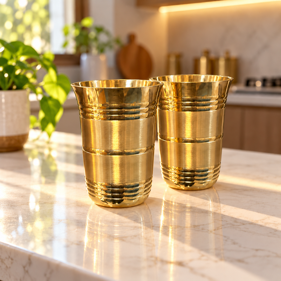 Royal ribbed brass tumbler set of two in a sunlit kitchen
